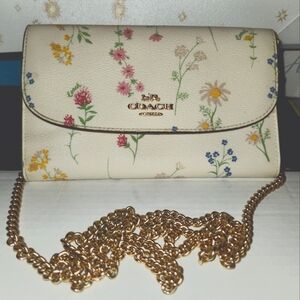 EUC COACH GEMMA CLUTCH CROSSBODY W/ SPACED WILDFLOWER PRINT